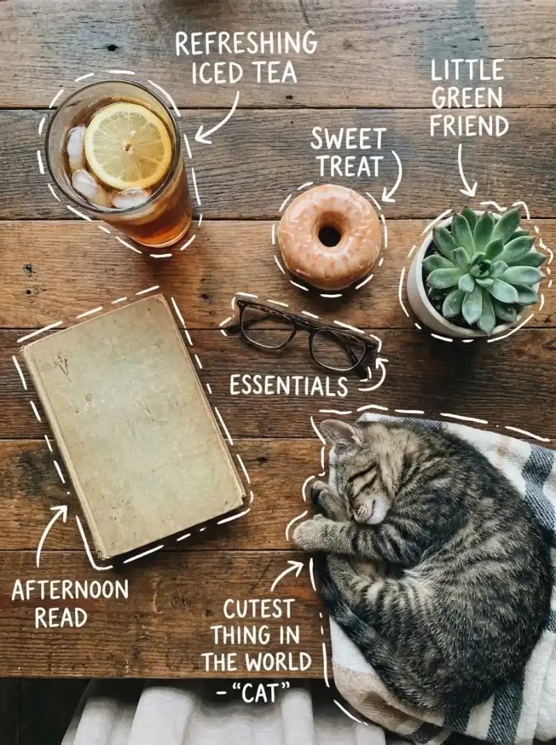 Top-down flat lay on a rustic wooden table, cozy aesthetic, soft natural light. A glass